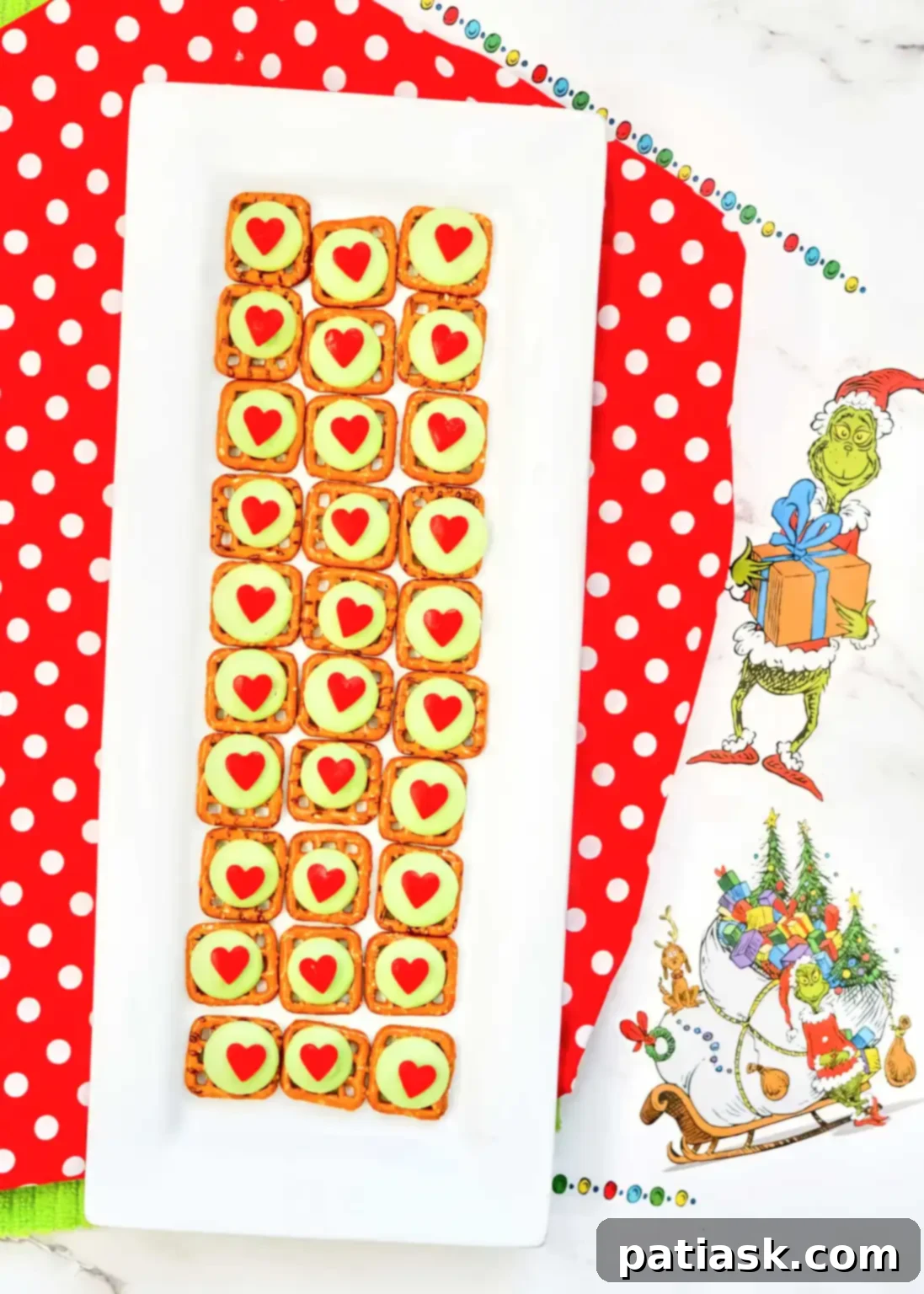 Super Easy Grinch Chocolate Covered Pretzels, a no-bake treat for movie night