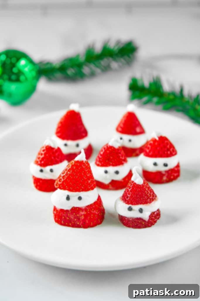 Cute 3-Ingredient Stuffed Santa Strawberries with faces