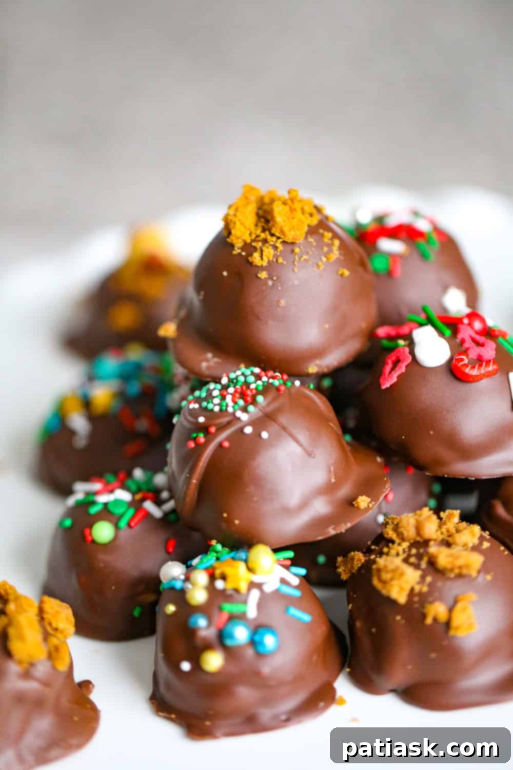 Luxurious Biscoff Cookie Butter Truffles with chocolate coating and cookie bits