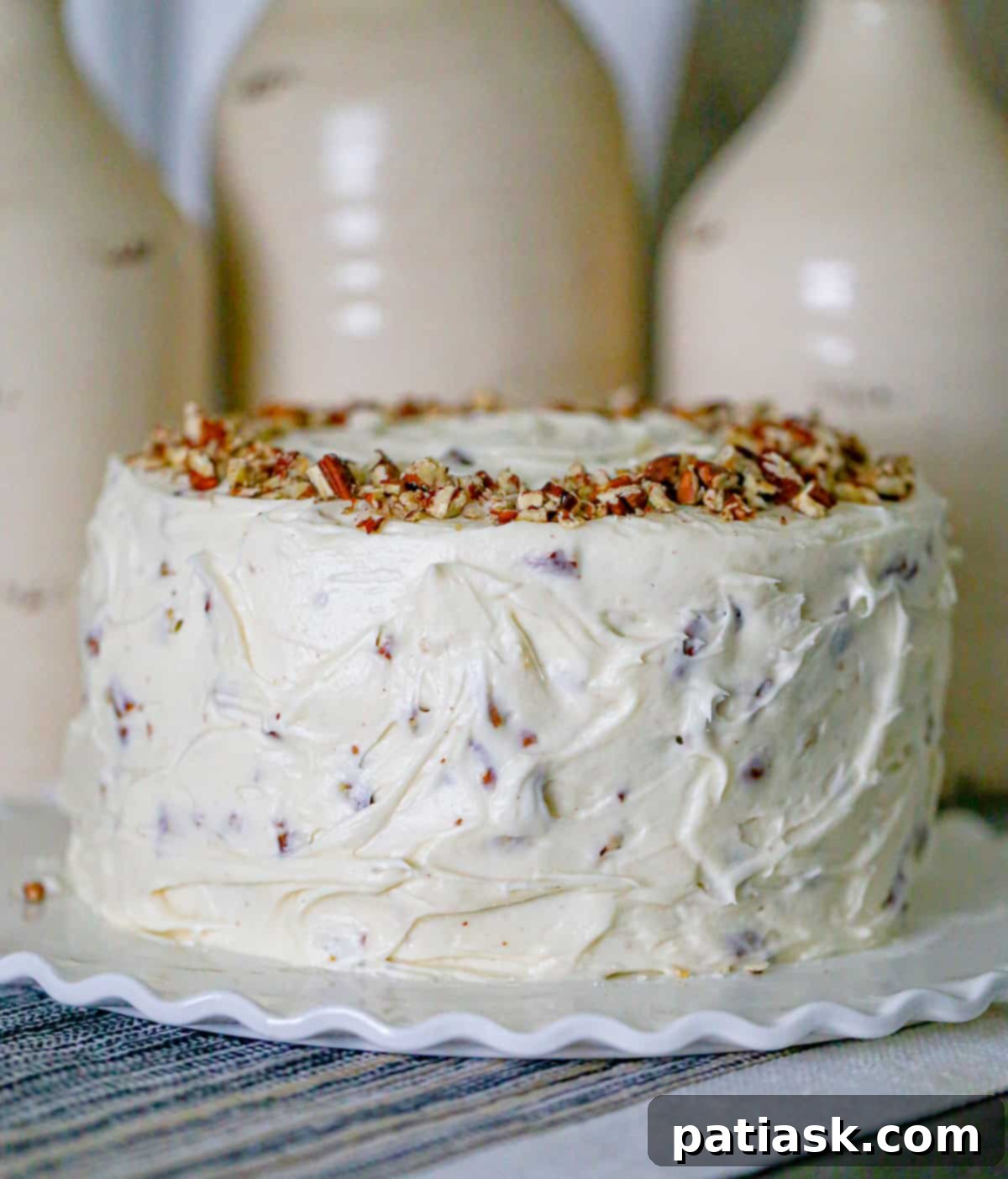 Prepared cake batter with coconut and pecans, ready for baking.