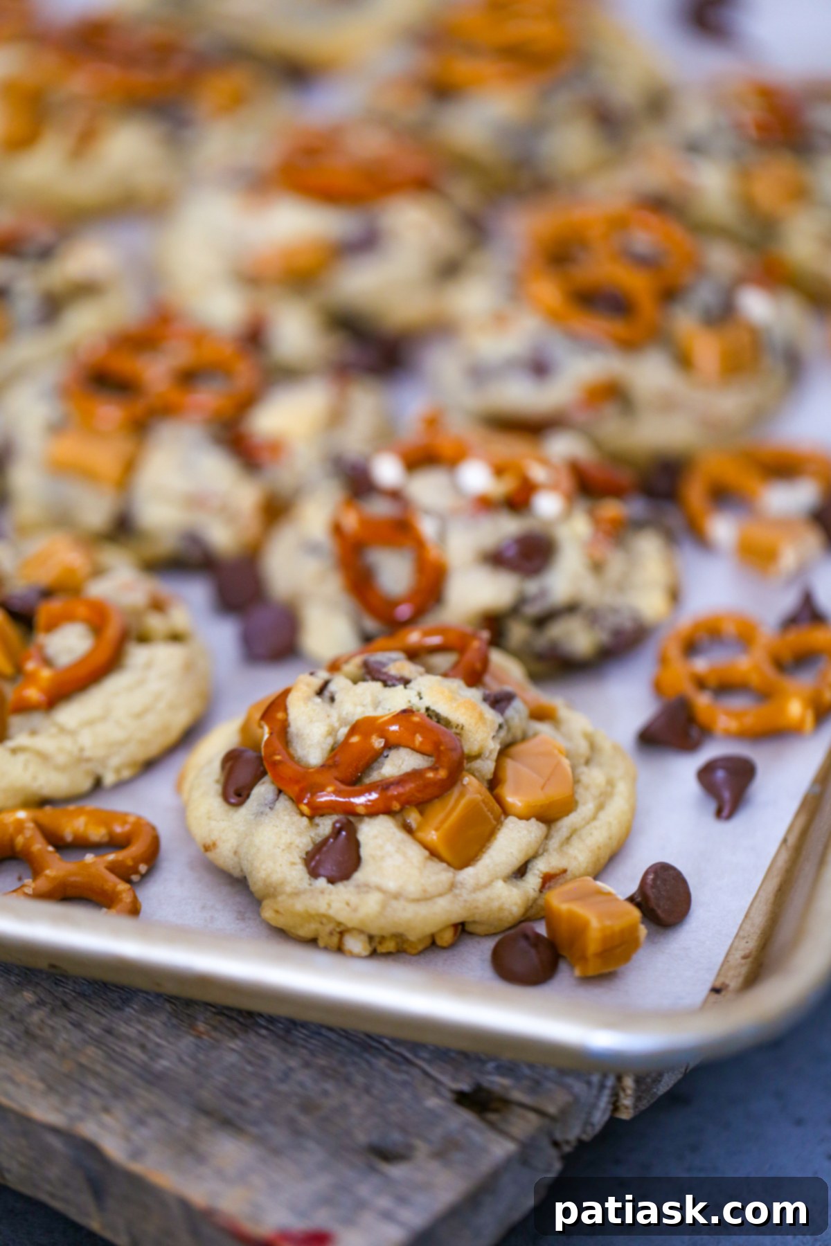 65 Festive Christmas Cookie Creations 49 Caramel Pretzel Chocolate Chip Cookies, showing caramel, pretzels, and chocolate chips