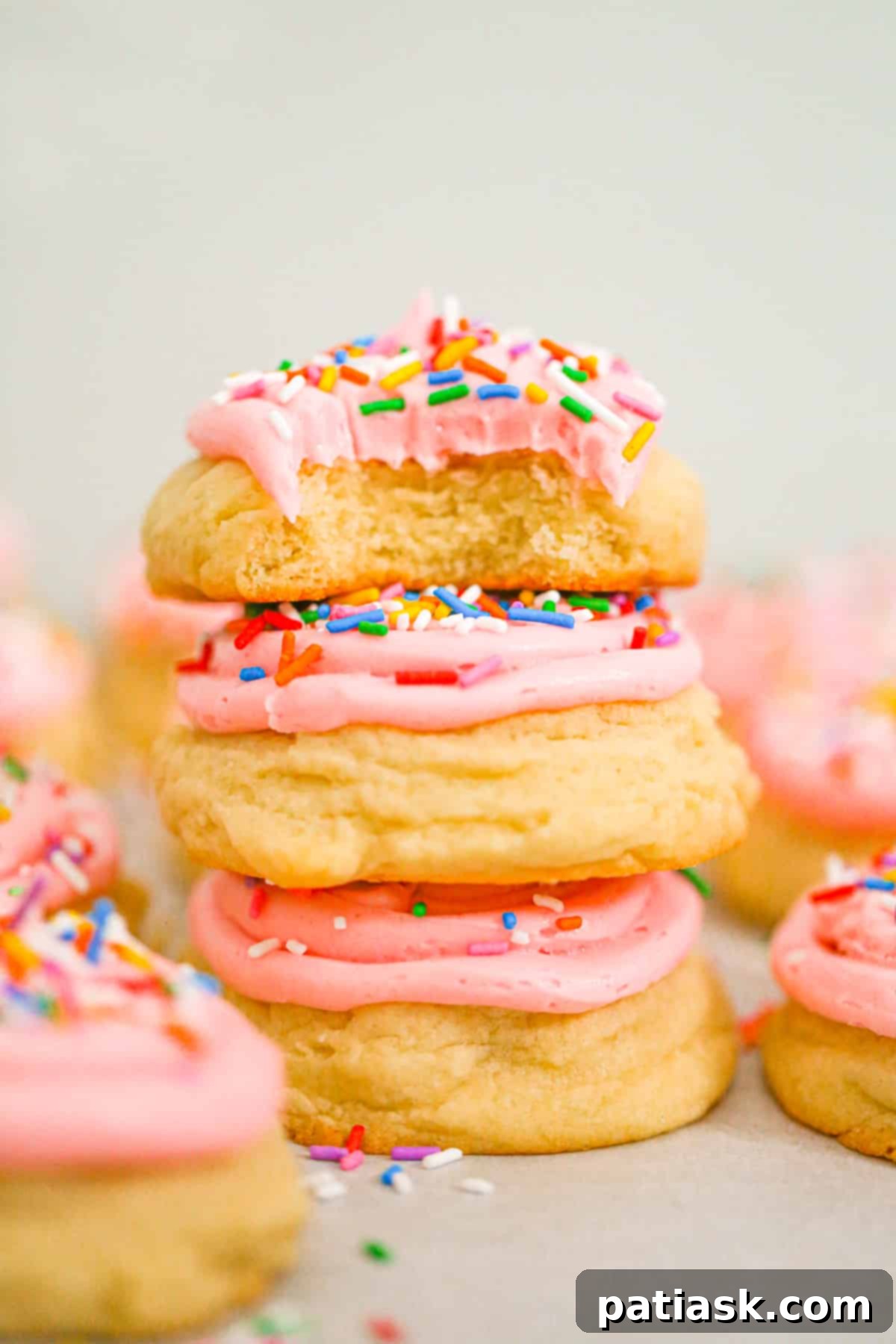 65 Festive Christmas Cookie Creations 63 Pink Crumbl Sugar Cookies with thick buttercream frosting