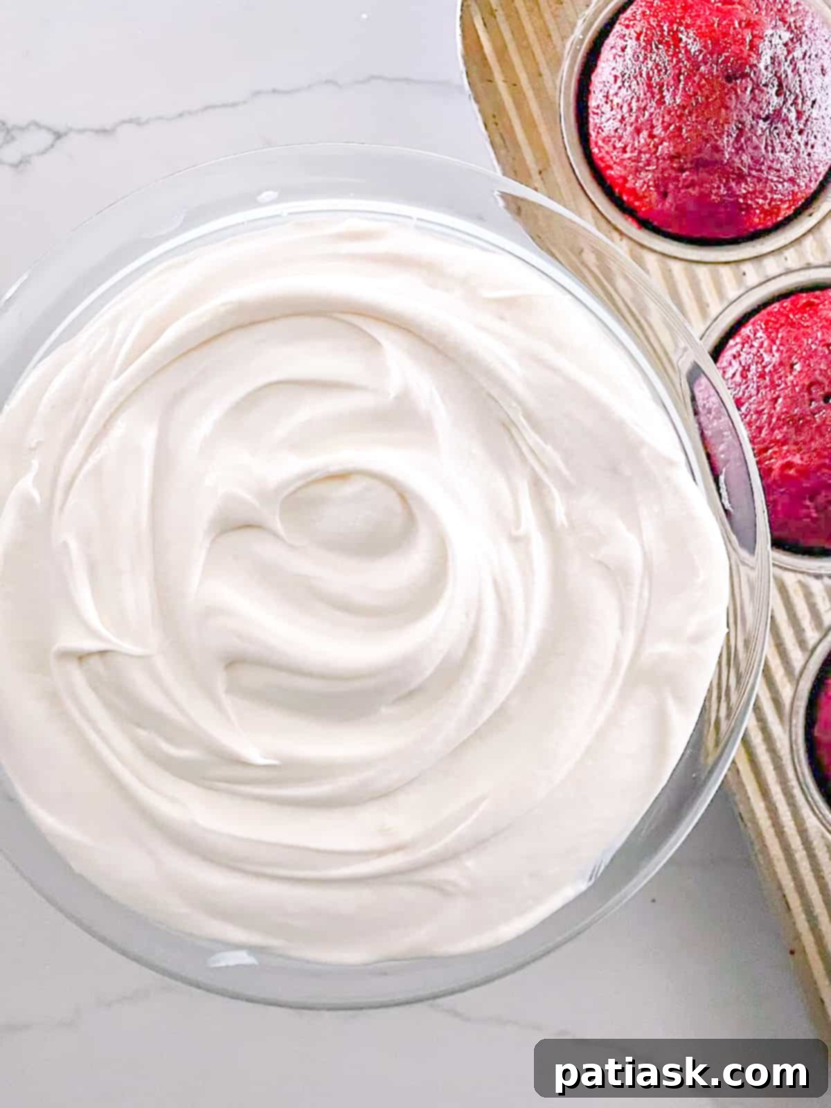 Delicious homemade cream cheese frosting spread on a dessert