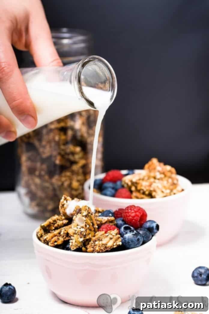 Low carb keto granola with almond milk, a healthy breakfast.