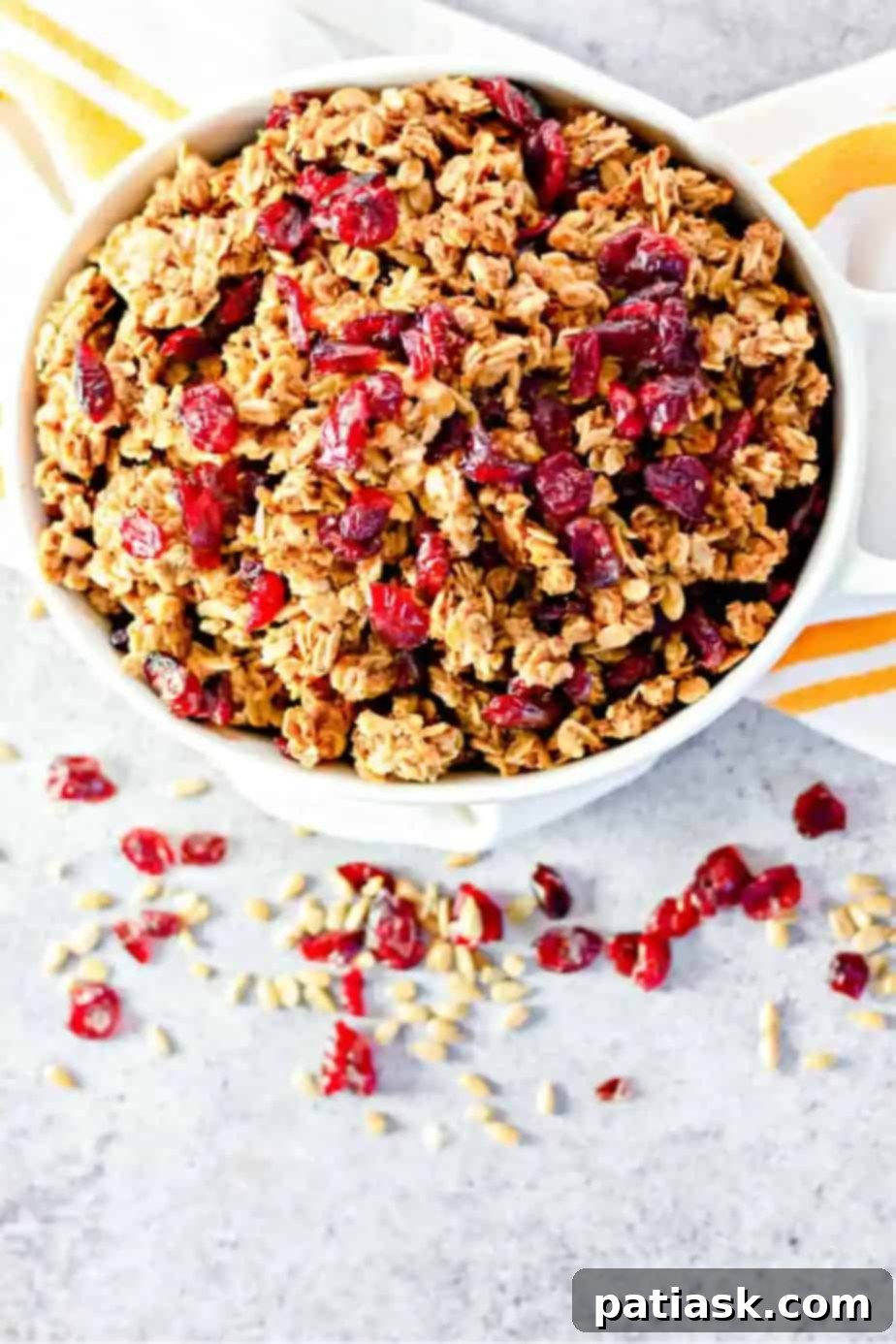 Crunchy homemade cranberry maple granola in a bowl.