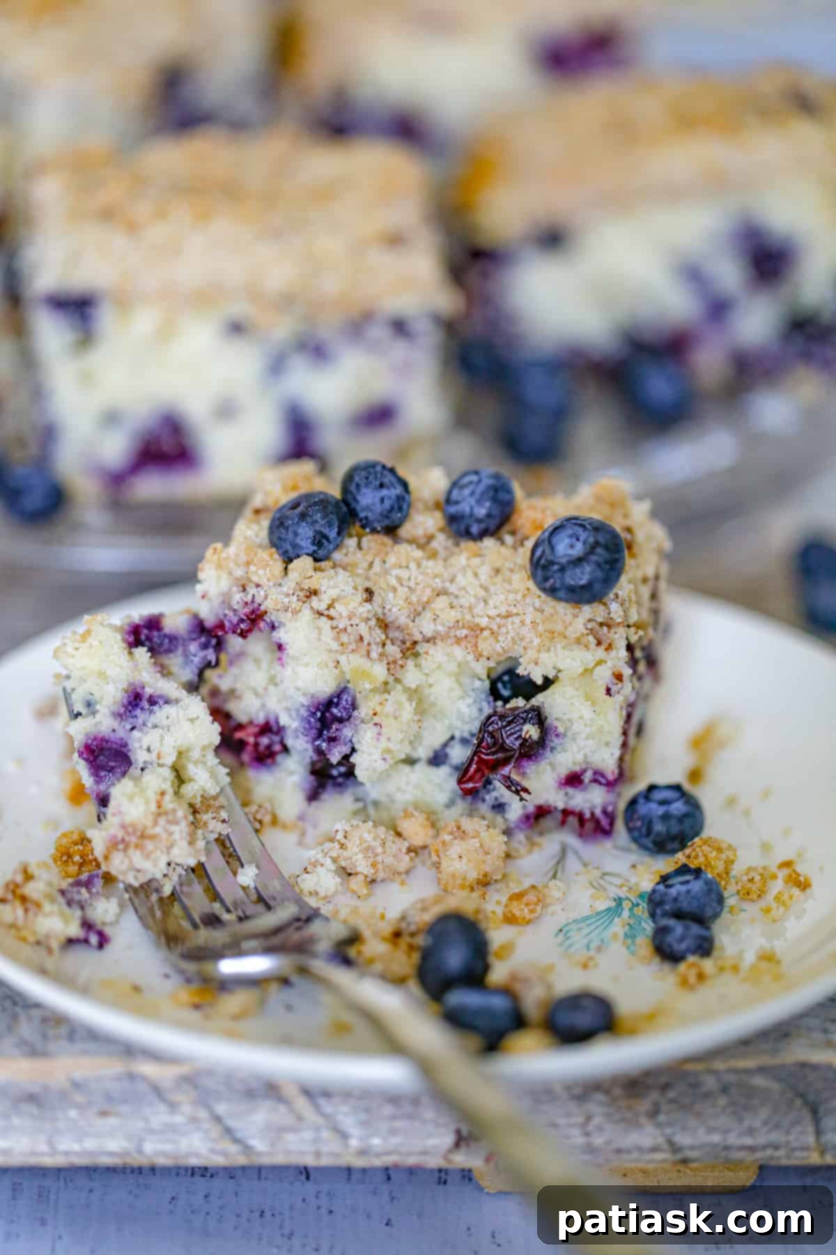 Slice of Blueberry Crumble Coffee Cake on a plate