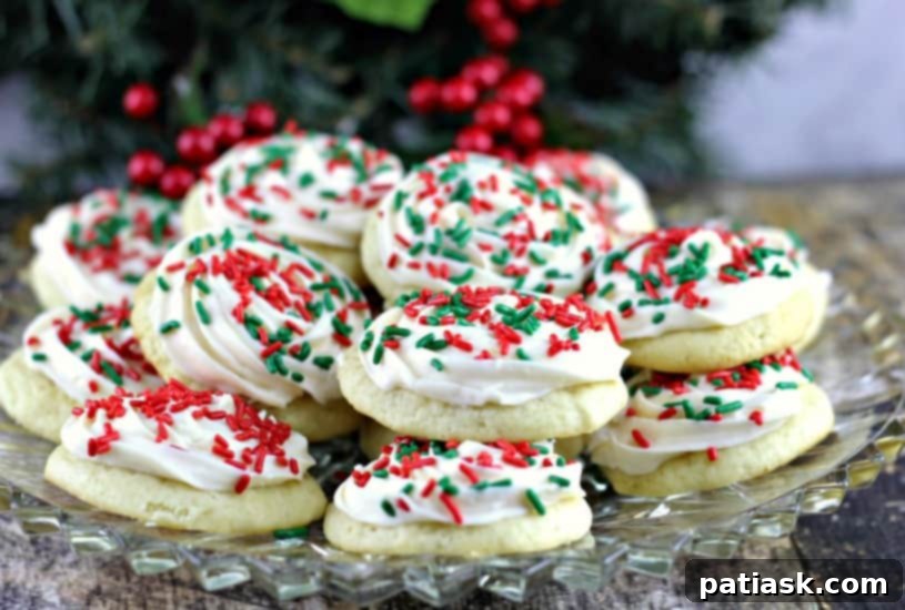 Best Soft Sour Cream Cookies with Buttercream Frosting - a trio of frosted and decorated cookies, close-up