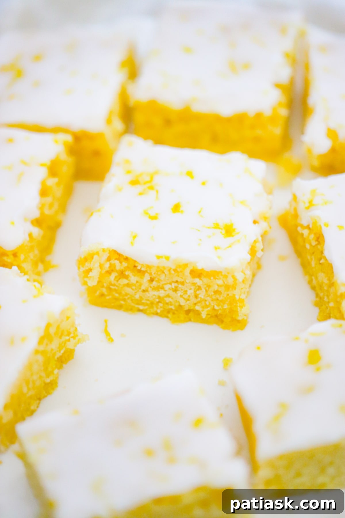 Best Homemade Lemon Brownies with a sweet and tangy glaze, perfect for any occasion.