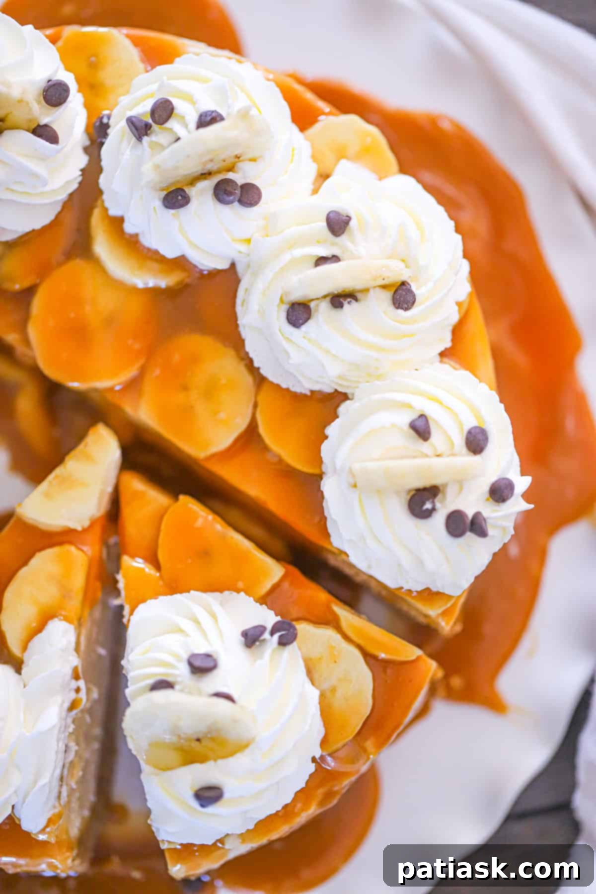 Luscious No-Bake Banoffee Peanut Butter Cheesecake 3 decadent No Bake Peanut Butter Banoffee pie Cheesecake recipe with caramel and bananas, close up