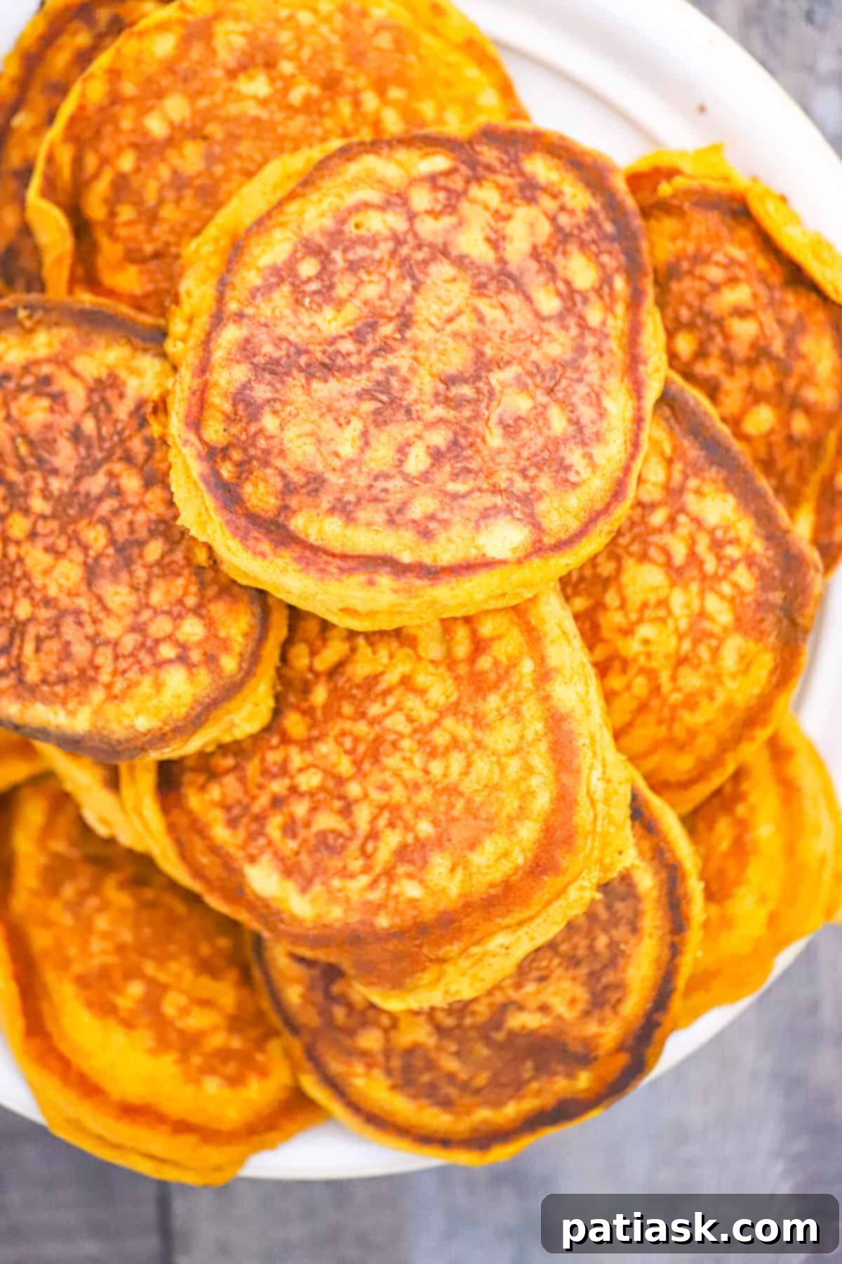 Extra Thick Pumpkin Pancakes 7 Best Super Light and Fluffy Pumpkin Pancakes recipe with a dusting of cinnamon