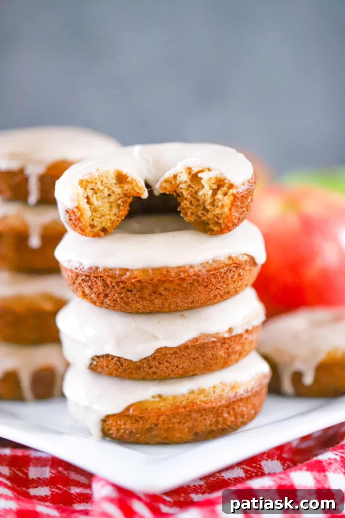 Homemade Baked Apple Cider Donuts with glaze recipe close up detail