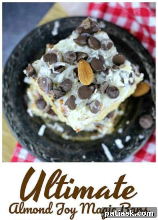 Almond Coconut Dream Bars 7 A single square of Ultimate Almond Joy Magic Bars, with a clear view of its rich layers