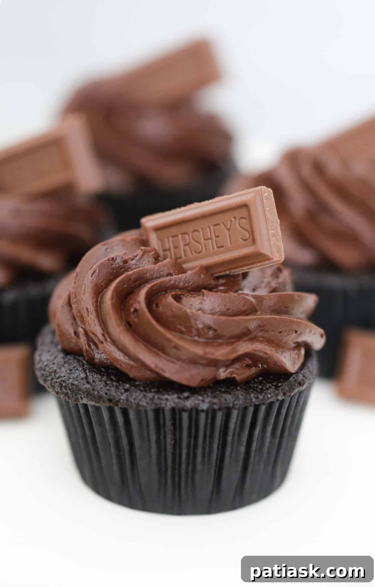 Perfect Hershey's chocolate cupcakes with creamy chocolate icing, a classic and easy game day dessert.