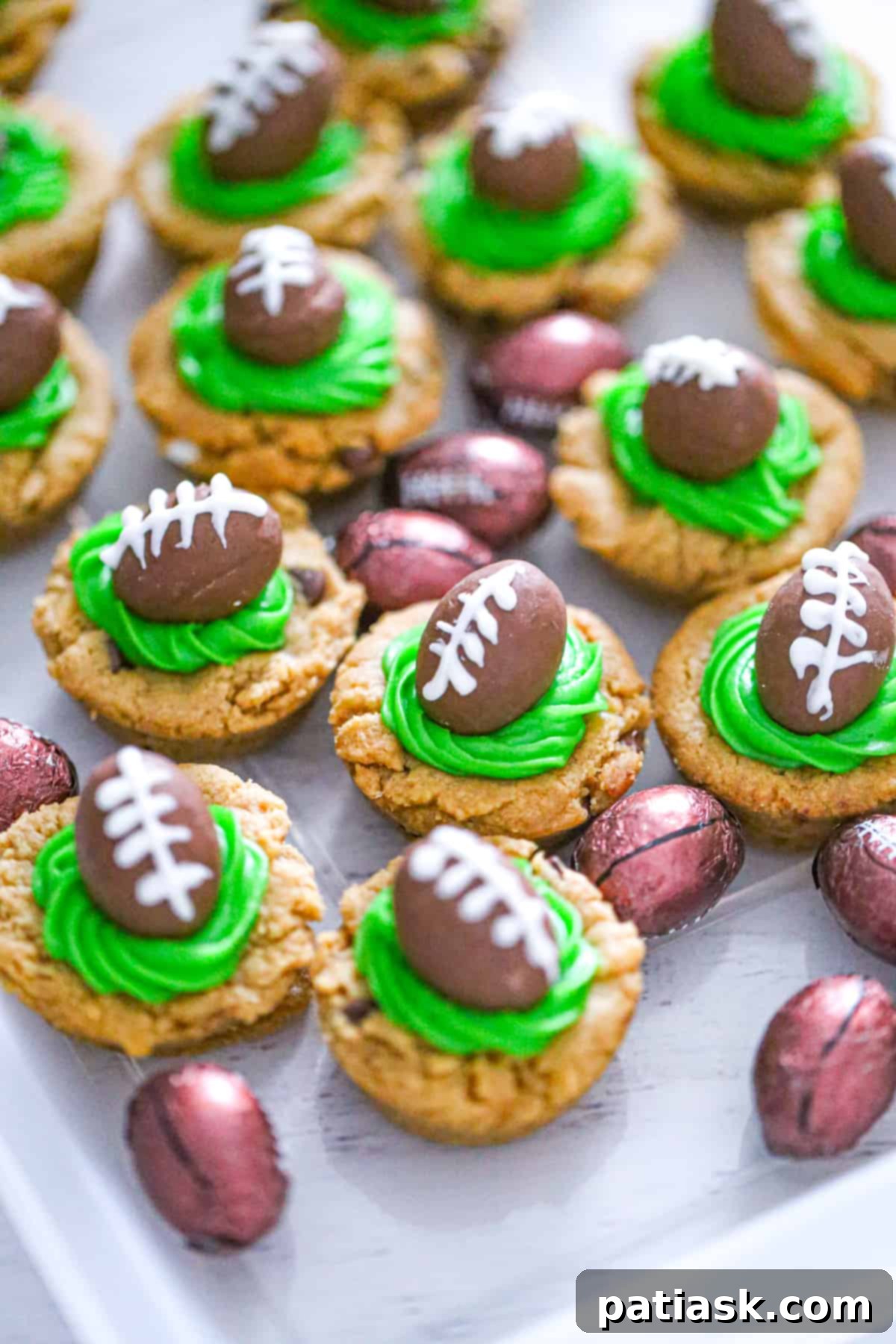 Chocolate football peanut butter cookies, a fun and delicious combination of chocolate and peanut butter shaped like footballs.