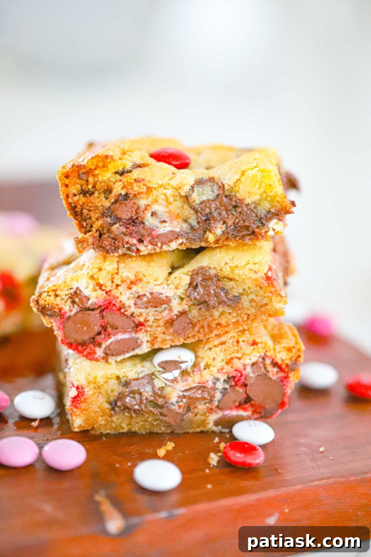Fudgy Valentine M and M Bars 3 Thick & Delish Valentine M&M Bars, an indulgent and easy-to-make dessert for any occasion, featuring colorful M&Ms and rich chocolate chips.