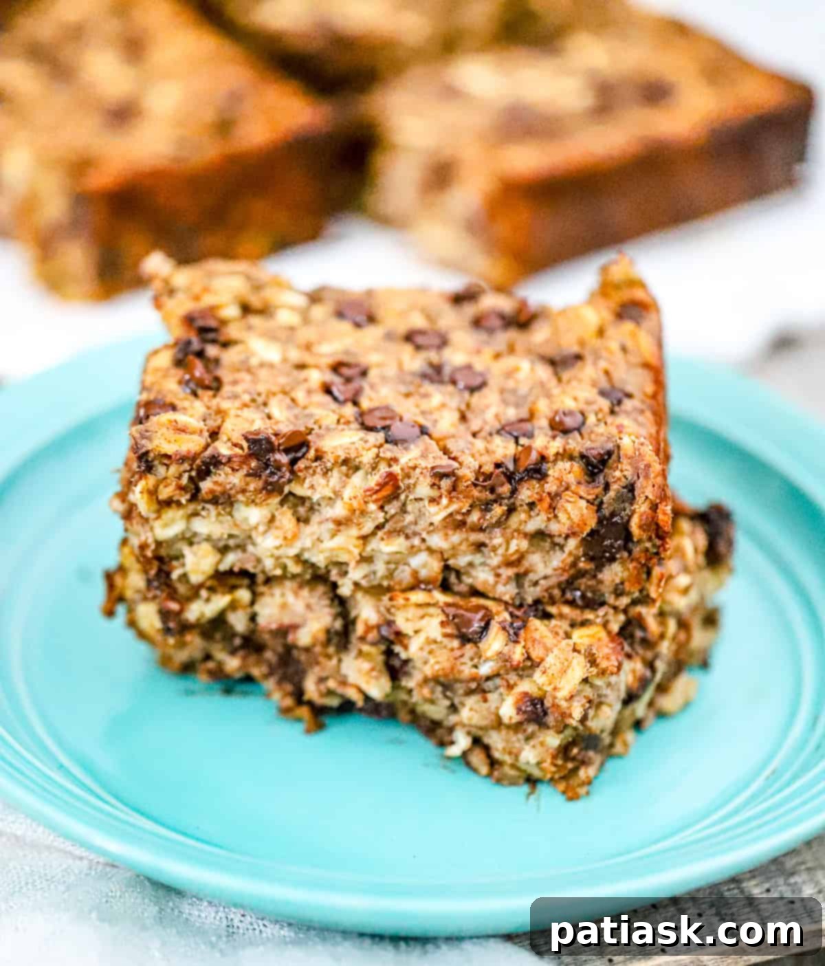 Wholesome Banana Chocolate Chip Baked Oats 2 Divine Healthy Banana Chocolate Chip Baked Oatmeal recipe: a vegan, protein-packed, fiber-rich breakfast option