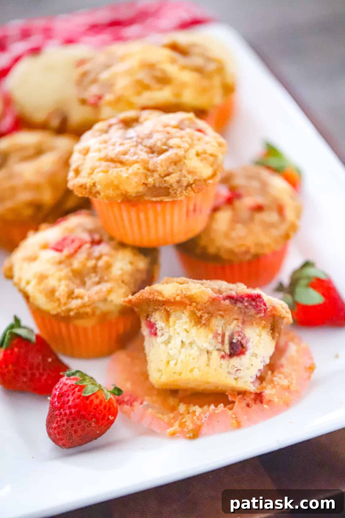 Delicious Strawberry Streusel Cobbler Muffins with golden topping