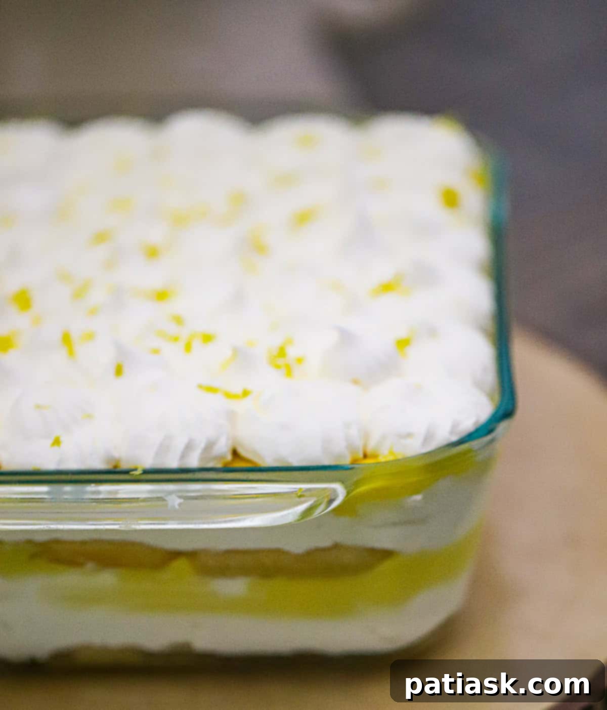 Lemony Tiramisu Delight 4 Close-up of a slice of lemon tiramisu