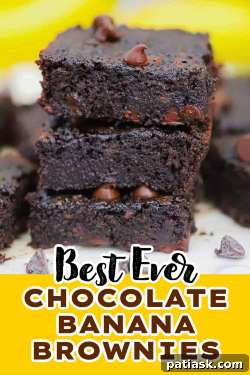 Stack of fudgy chocolate banana brownies on a serving board