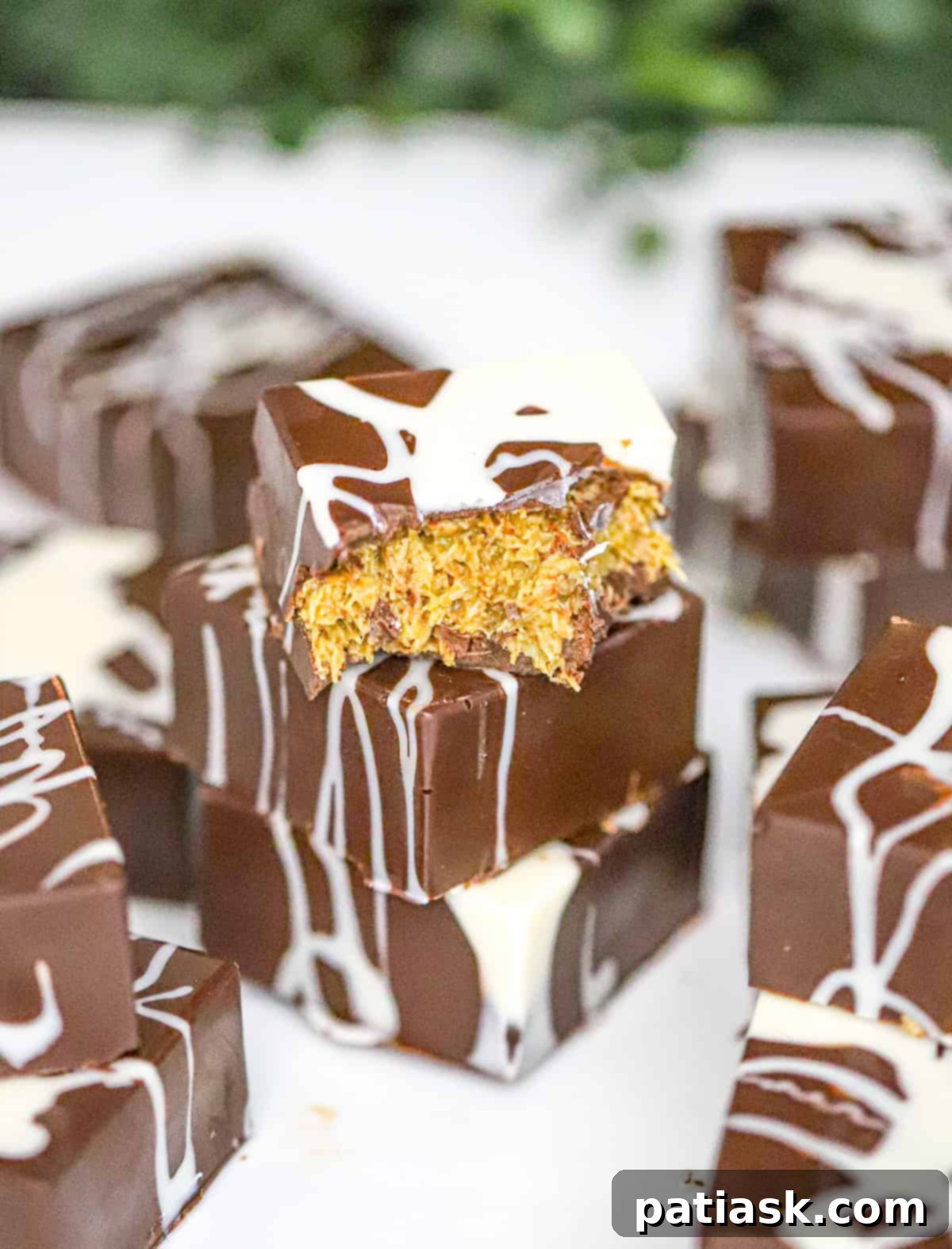 Desert Oasis Chocolate Bars 2 Homemade Chocolate Dubai Bars recipe with tahini, pistachio butter and phyllo dough, elegantly arranged.