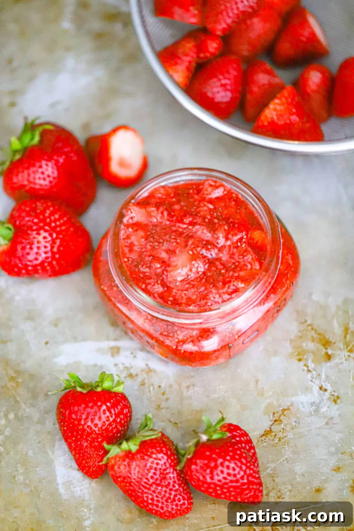 Wholesome Strawberry Chia Jam 2 Freshly made strawberry chia jam in a jar