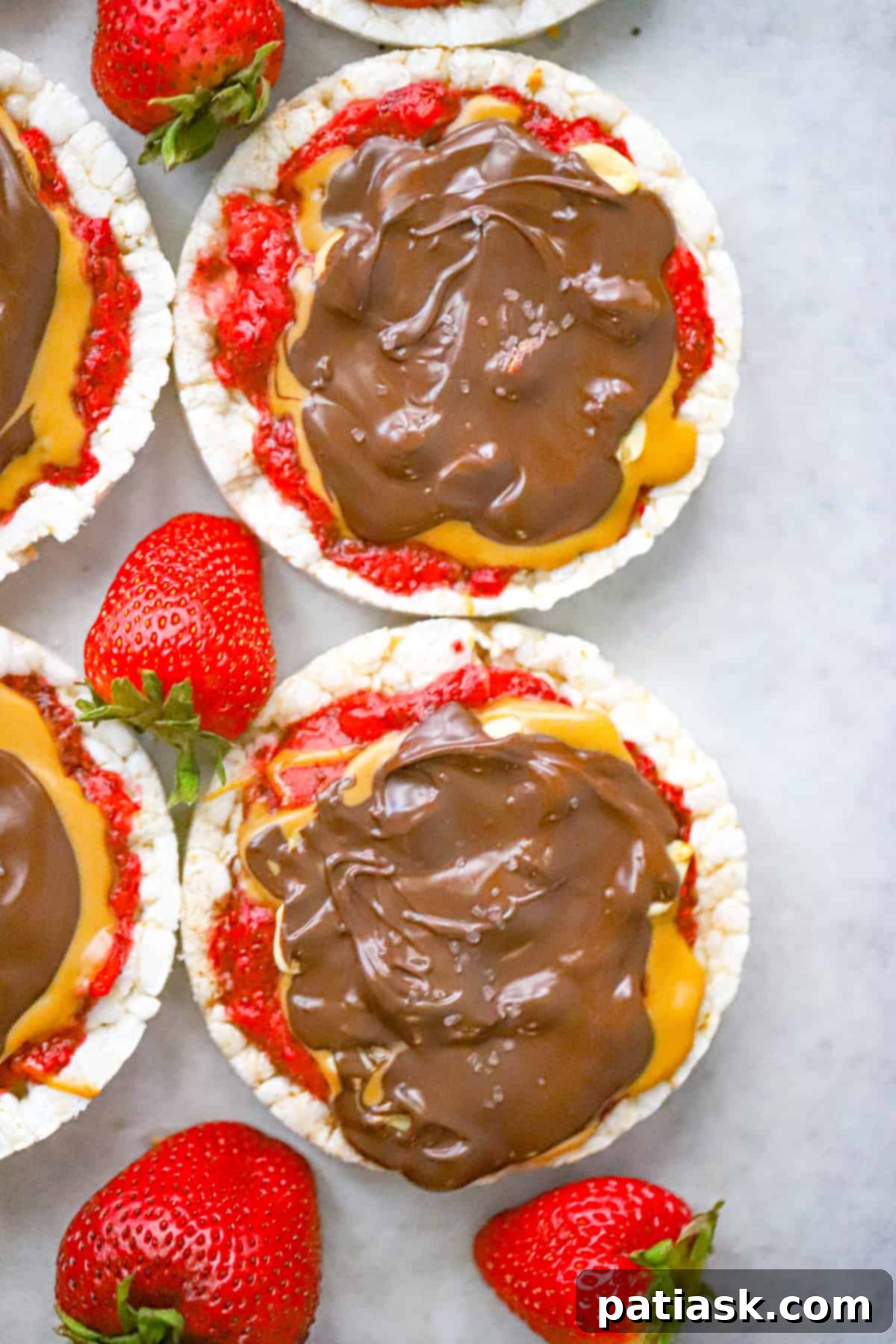 Strawberry Peanut Butter Chocolate Rice Cake Bliss 4 Ingredients for healthy Strawberry Peanut Butter Chocolate Rice Cakes