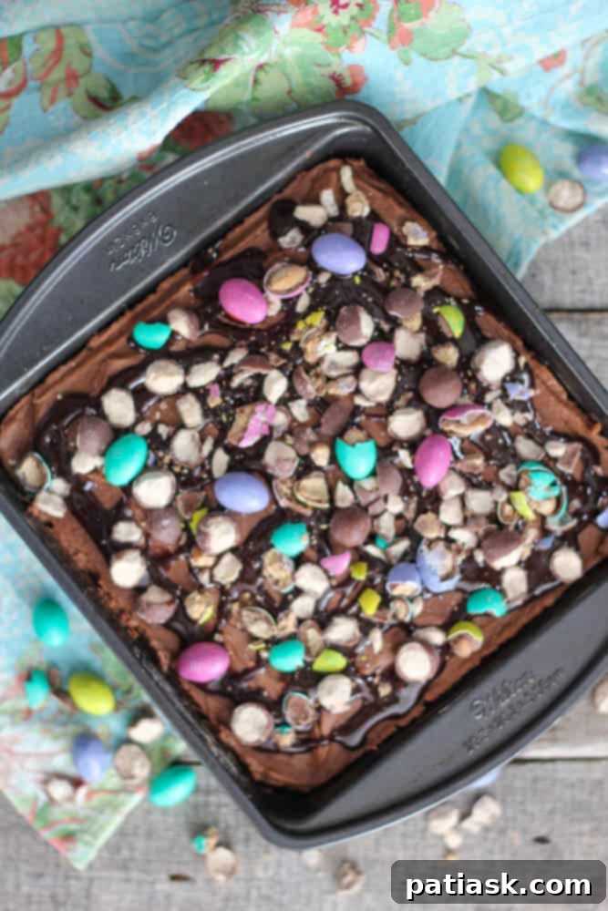 Ultimate Malted Peanut Butter Chocolate Poke Cake 6 Delicious Chocolate Peanut Butter Malt Poke Cake slice with various toppings