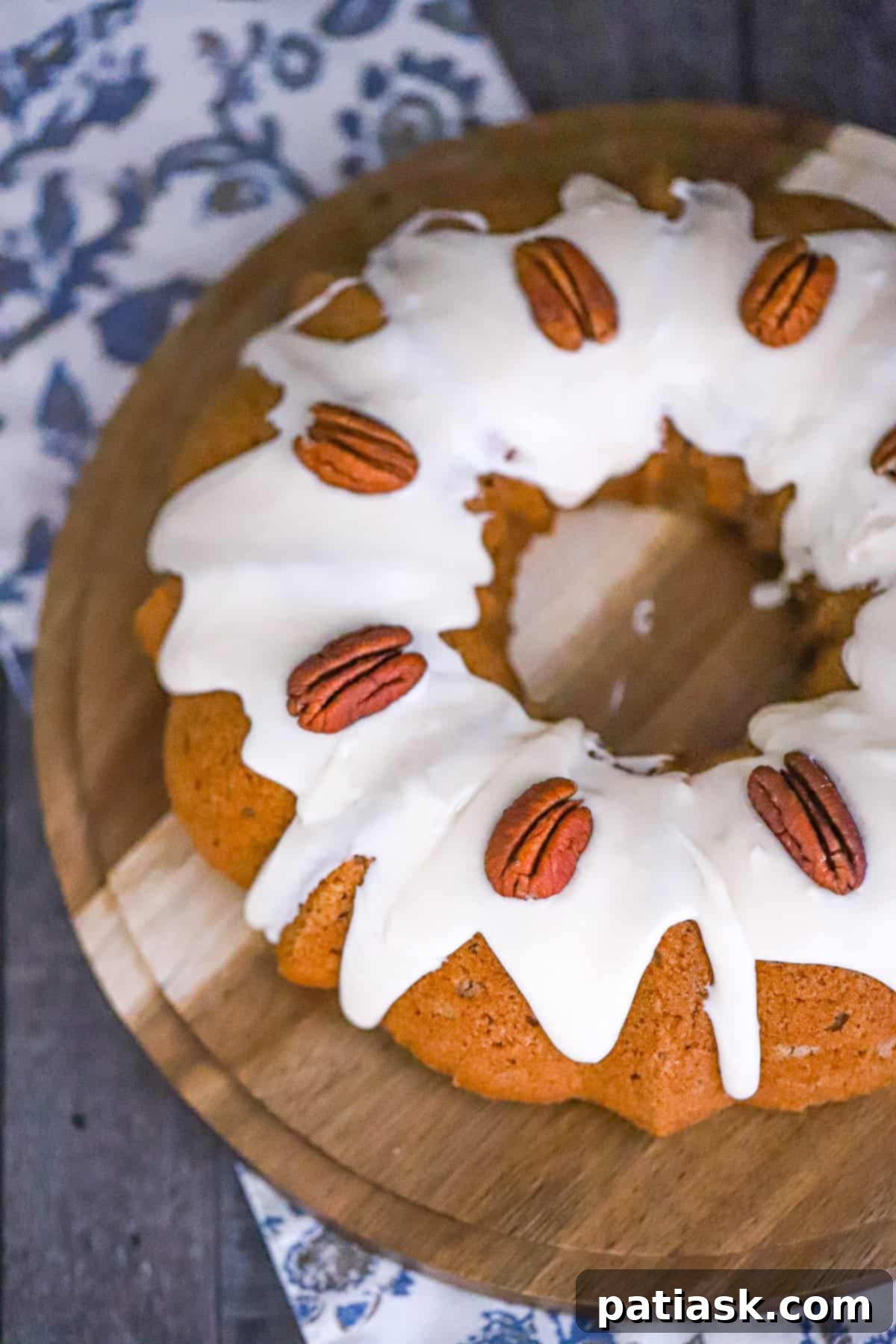 Sliced Apple Spice Bundt Cake from mix on a plate, showing its moist interior.