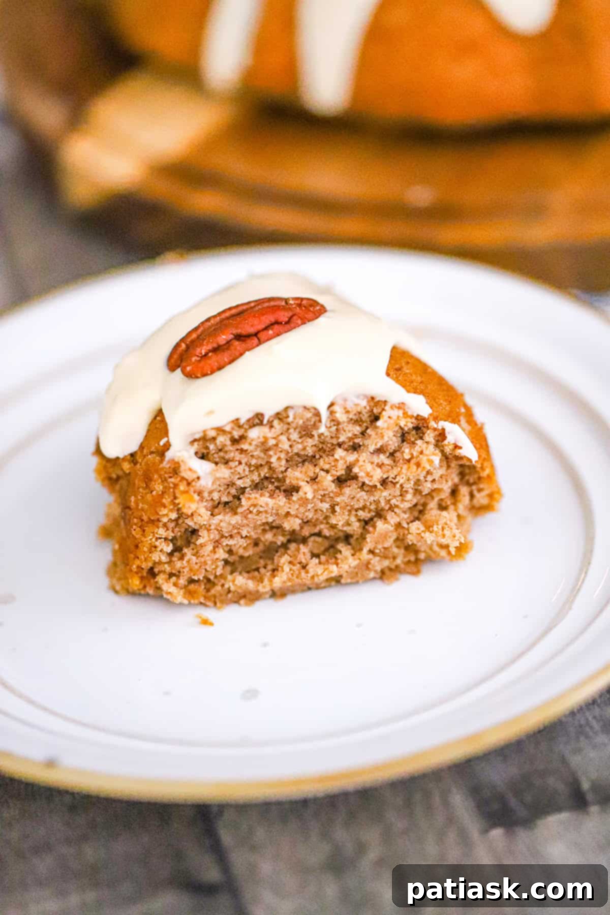 Spice cake mix bundt cake with vanilla glaze drizzle.
