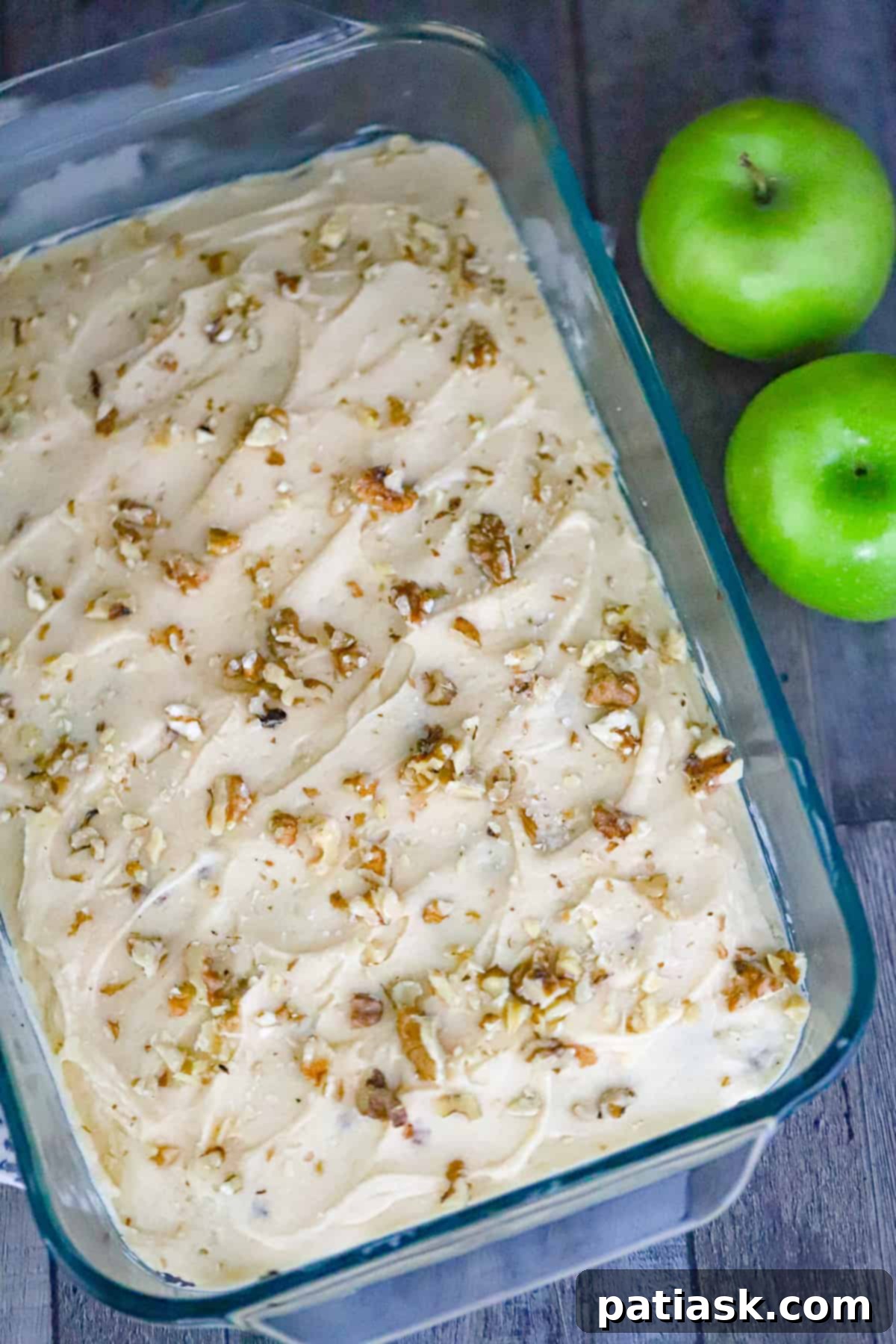 Autumn Apple Spice Cake with Creamy Caramel 4 Spice cake with apple filling and caramel frosting, ready for baking