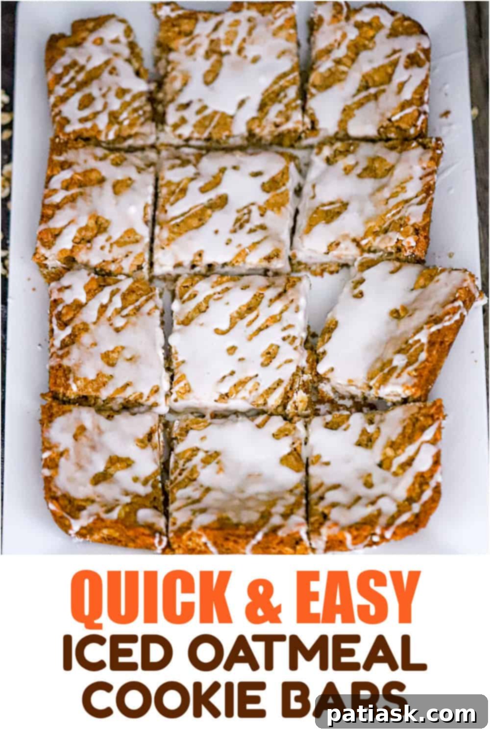 Frosted Oatmeal Bliss Bars 8 A close-up of a stack of iced oatmeal cookie bars, showing off the perfectly set icing.