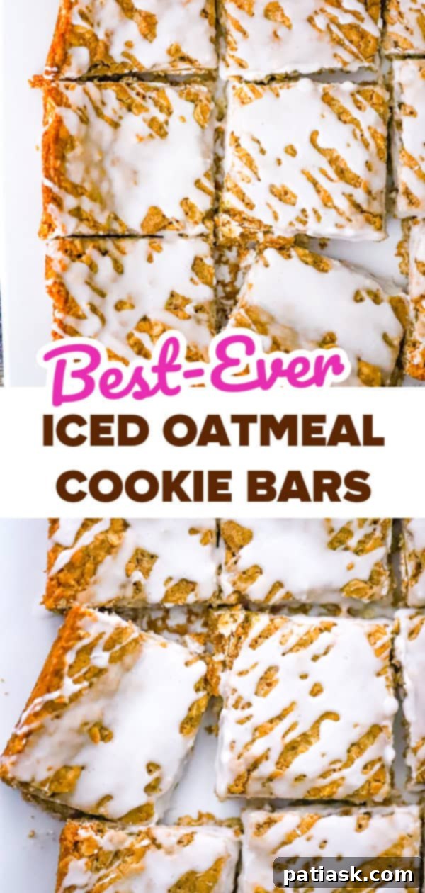 Frosted Oatmeal Bliss Bars 9 Iced oatmeal cookie bars neatly cut and arranged on a serving plate, ready to be enjoyed.