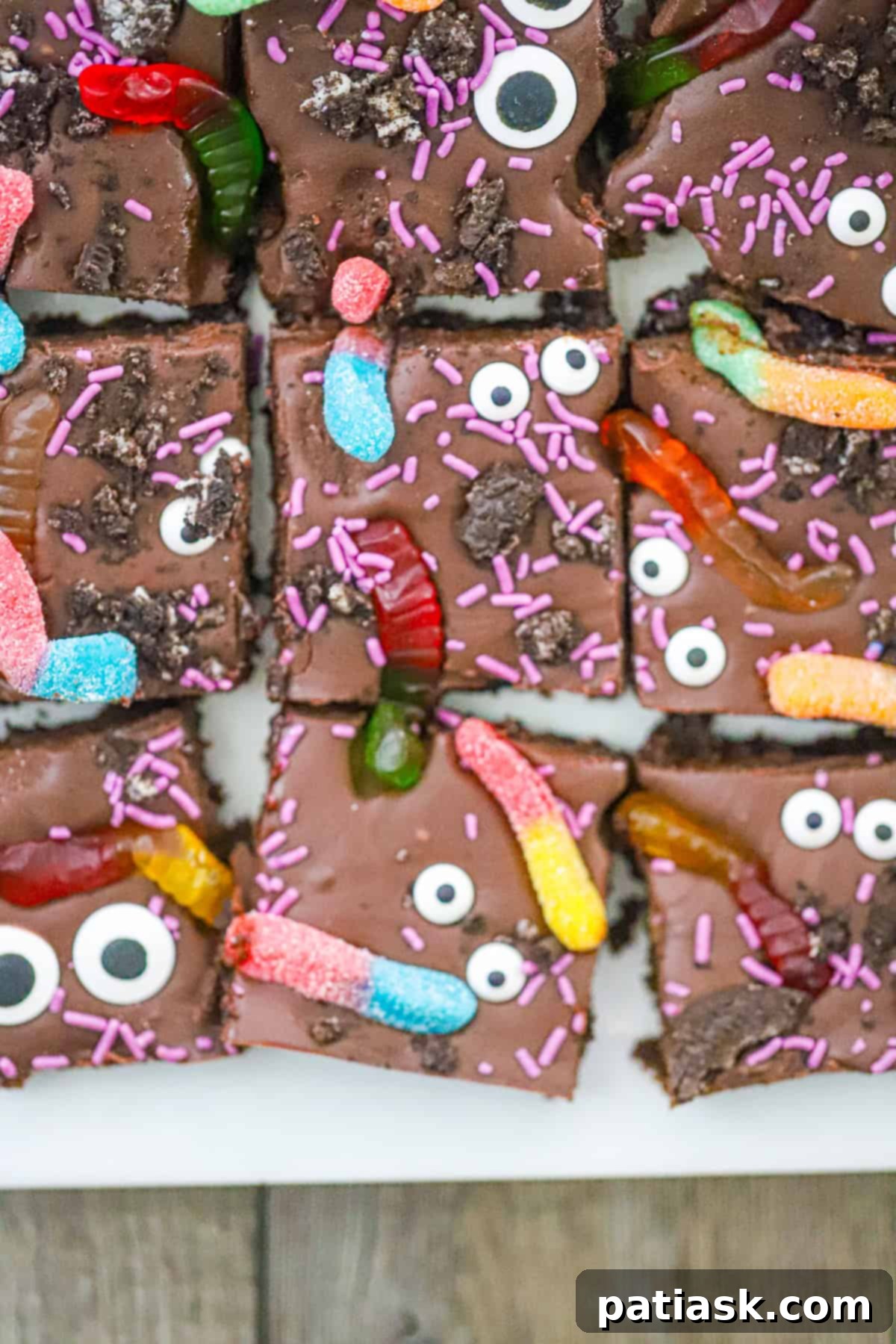 Monster Mash Brownies 6 Spooky Halloween brownies in a pan, ready to be cut