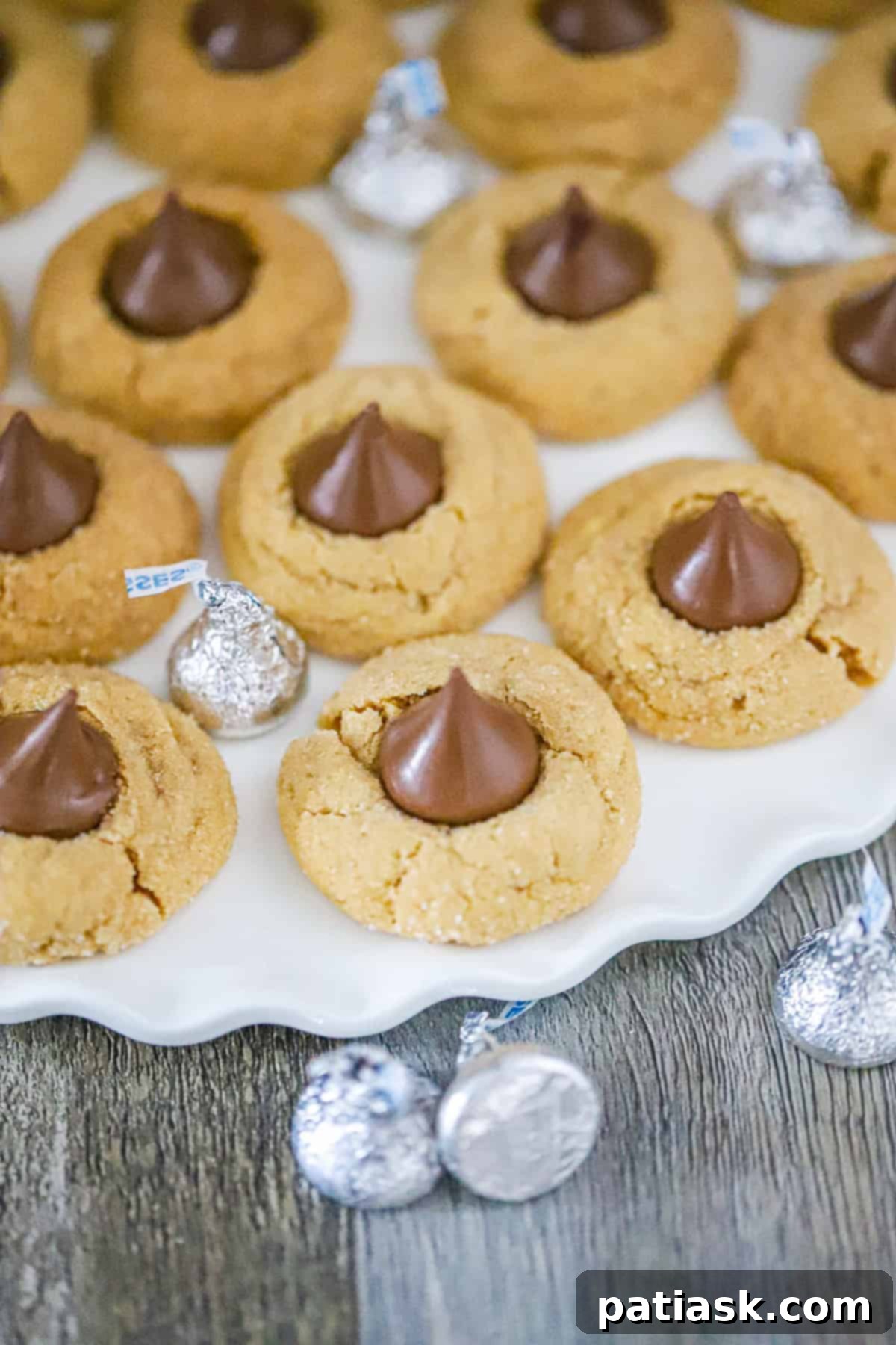Peanut Butter Kiss Cookies 3 Ingredients for making peanut butter blossom cookies, laid out for easy preparation.