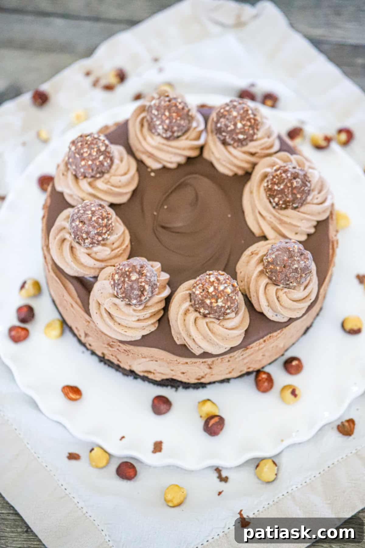 Decadent No-Bake Nutella Bliss 4 Delicious no-bake Nutella cheesecake with Ferrero Rocher candies