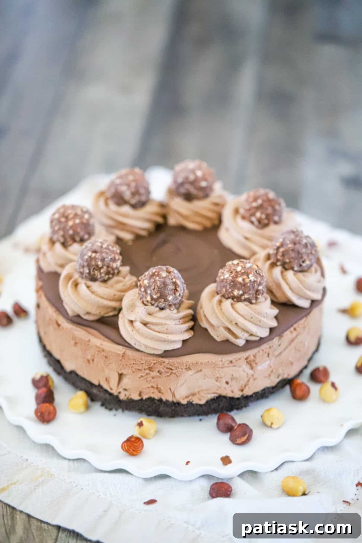 Decadent No-Bake Nutella Bliss 6 Nutella NO BAKE CHEESECAKE slice on a plate with fork