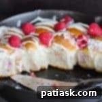 Heavenly Raspberry White Chocolate Sharing Rolls 13 Heavenly cream cheese and berry stuffed rolls after baking.