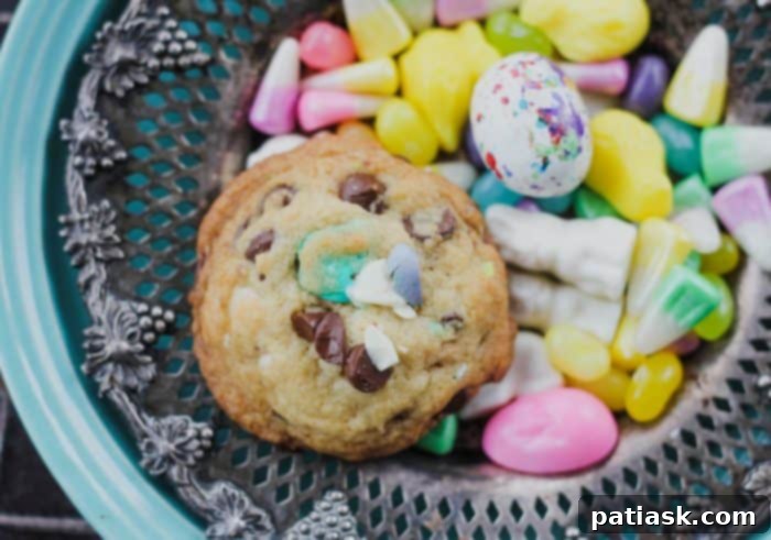 Velvety Cheesecake Chocolate Chip Cookies 3 Close-up of Cheesecake Pudding Chocolate Chip M&M Cookies showing soft interior and melted chocolate chips.
