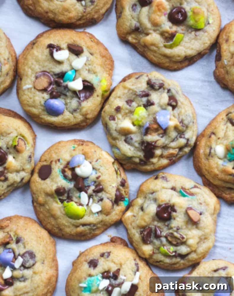 Velvety Cheesecake Chocolate Chip Cookies 5 A stack of perfectly baked Cheesecake Pudding Chocolate Chip M&M Cookies.