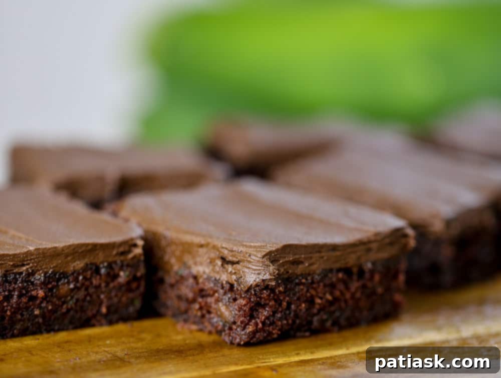 Moist and rich zucchini brownie recipe with chocolate frosting