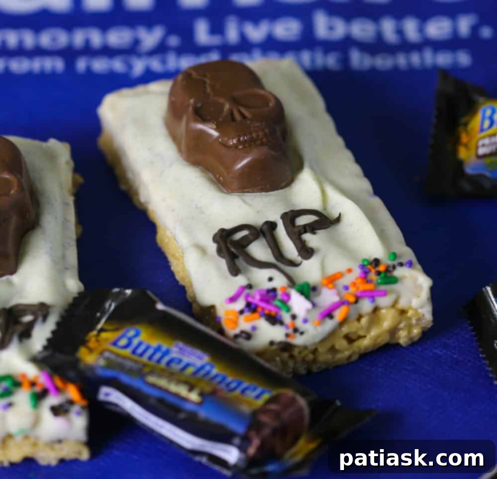 Tombstone Butterfinger Peanut Butter Skull Delights 12 A close-up overhead shot of three Butterfinger Skull Tombstone Treats with sprinkles
