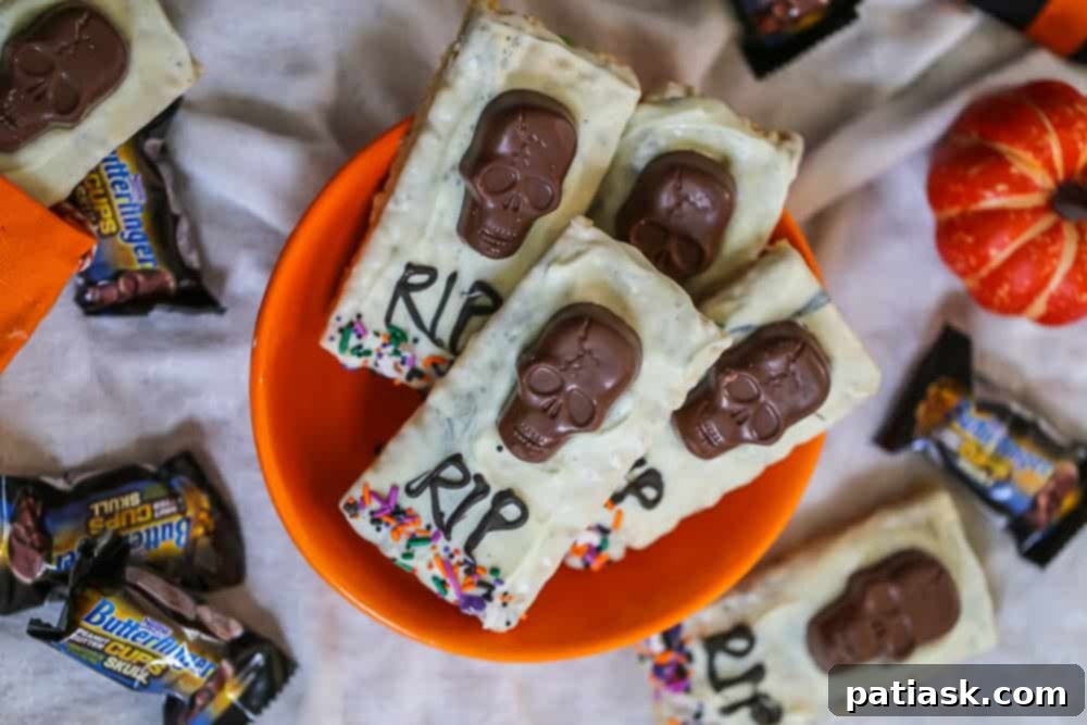 Tombstone Butterfinger Peanut Butter Skull Delights 3 Close-up of Butterfinger Skull Tombstone Treats with peanut butter krispies and white chocolate