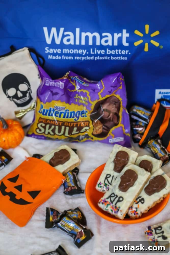 Tombstone Butterfinger Peanut Butter Skull Delights 4 Butterfinger Skull Tombstone Treats displayed on a white platter, ready for a Halloween party