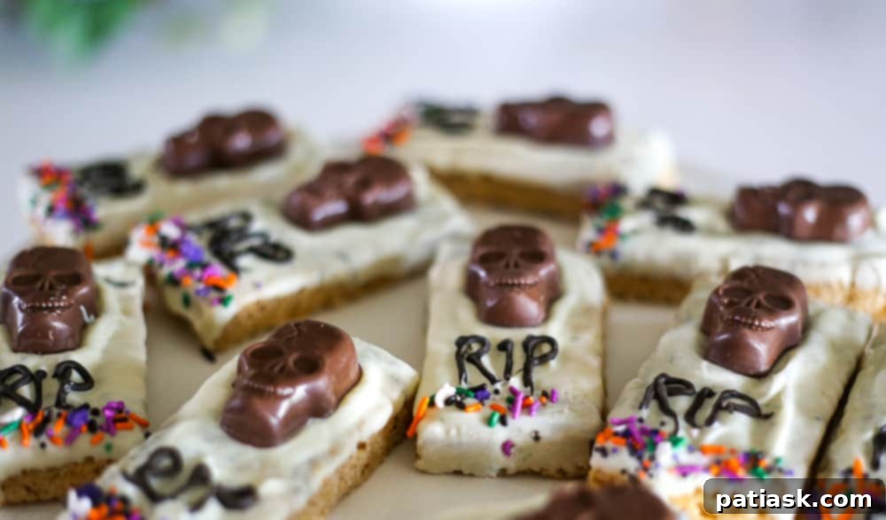 Tombstone Butterfinger Peanut Butter Skull Delights 5 Shopping cart filled with Halloween candy, including Butterfinger Peanut Butter Cup Skulls, from Walmart