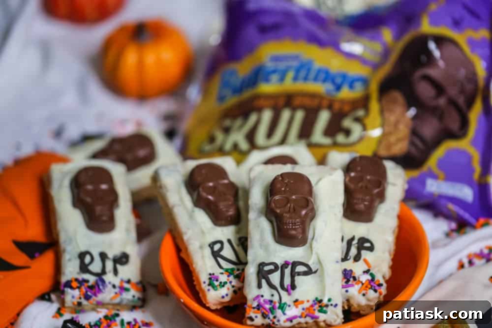 Tombstone Butterfinger Peanut Butter Skull Delights 10 Variety of Halloween snacks, including Butterfinger treats, in a festive setting
