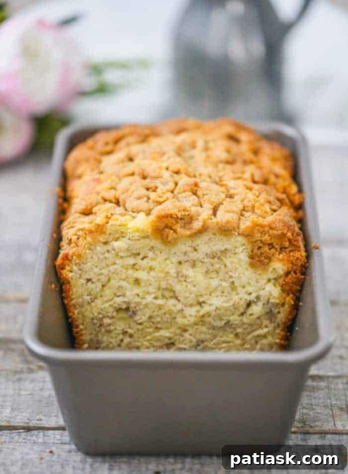 Close-up of Banana Cream Cheese Bread with Peanut Butter Streusel, ready to be enjoyed.