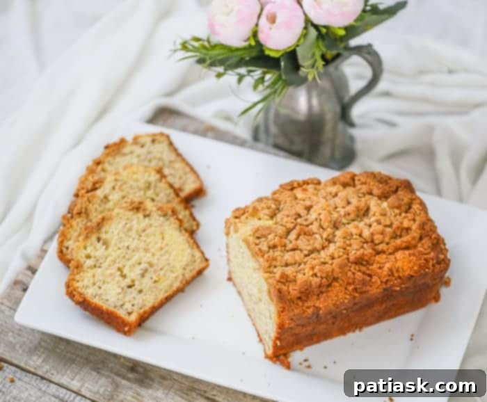 Banana Cream Cheese Bread with Peanut Butter Streusel sliced and ready to serve