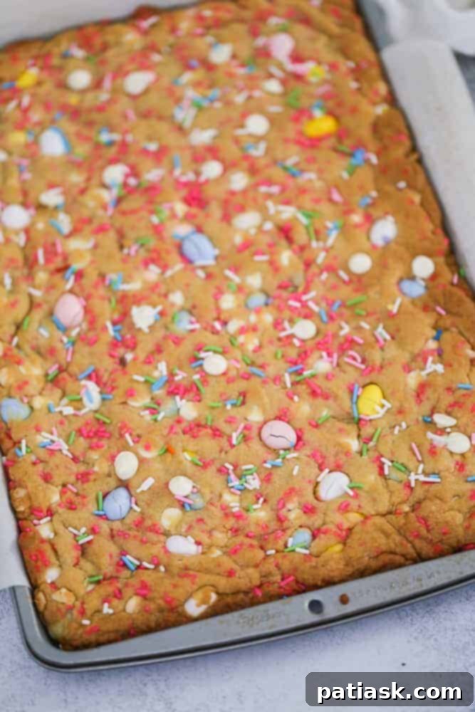 Assorted Cadbury Egg Cookie Bars arranged beautifully on a plate, highlighting their vibrant colors and appealing texture, ready for a dessert spread