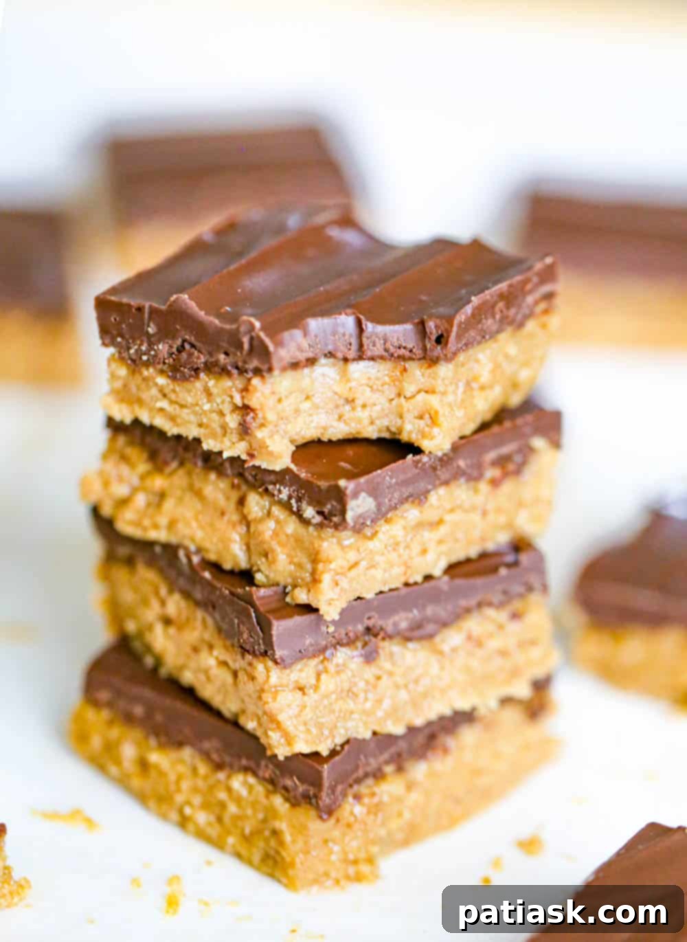 Easy 5-Ingredient Peanut Butter Bars 3 Up close view of the two delicious layers of no-bake peanut butter bars