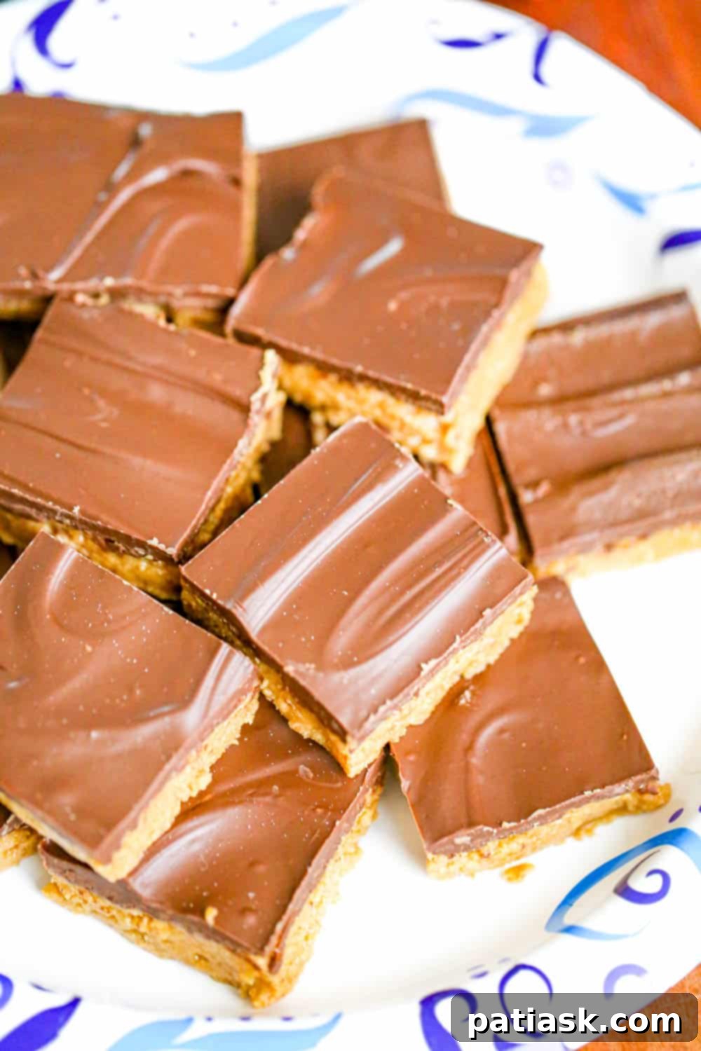 Easy 5-Ingredient Peanut Butter Bars 4 Close up of a pan of un-cut no-bake chocolate peanut butter bars